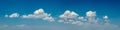 Panoramic sky - real blue sky during daytime with white light clouds Freedom and peace. Large photo format Cloudscape blue sky Royalty Free Stock Photo