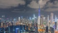 Panoramic skyline of Dubai with business bay and downtown district night timelapse. Royalty Free Stock Photo