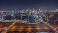 Panoramic skyline of Dubai with business bay and downtown district night timelapse. Royalty Free Stock Photo