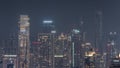 Panoramic skyline of Dubai with business bay and downtown district night timelapse. Royalty Free Stock Photo