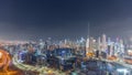 Panoramic skyline of Dubai with business bay and downtown district night timelapse. Royalty Free Stock Photo