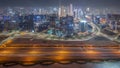 Panoramic skyline of Dubai with business bay and downtown district night timelapse. Royalty Free Stock Photo