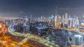 Panoramic skyline of Dubai with business bay and downtown district night timelapse. Royalty Free Stock Photo