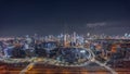 Panoramic skyline of Dubai with business bay and downtown district night timelapse. Royalty Free Stock Photo