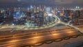 Panoramic skyline of Dubai with business bay and downtown district night to day timelapse. Royalty Free Stock Photo