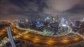 Panoramic skyline of Dubai with business bay and downtown district night to day timelapse. Royalty Free Stock Photo