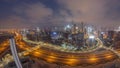 Panoramic skyline of Dubai with business bay and downtown district night to day timelapse. Royalty Free Stock Photo