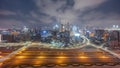 Panoramic skyline of Dubai with business bay and downtown district night to day timelapse. Royalty Free Stock Photo