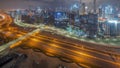 Panoramic skyline of Dubai with business bay and downtown district night to day timelapse. Royalty Free Stock Photo