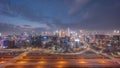 Panoramic skyline of Dubai with business bay and downtown district day to night timelapse. Royalty Free Stock Photo