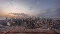 Panoramic skyline of Dubai with business bay and downtown district day to night timelapse. Royalty Free Stock Photo