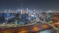 Panoramic skyline of Dubai with business bay and downtown district night timelapse. Royalty Free Stock Photo