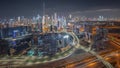 Panoramic skyline of Dubai with business bay and downtown district night timelapse. Royalty Free Stock Photo