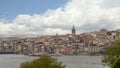 Skyline of European side of Bosphorus Strait overlooking Galata Tower with cloudy sky in a spring day, Istanbul, Turkey Royalty Free Stock Photo