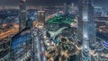 Panoramic skyline view of Dubai downtown with mall, fountains and Burj Khalifa aerial night timelapse Royalty Free Stock Photo