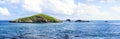 Panoramic of small rocky cay in Caribbean