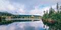 Panoramic spectacular view to Strbske Pleso in High Tatras - a mountain lake at 1350m. Popular trekking routes, ski resort, and