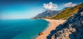 Panoramic spring view of publik beach in Dhermi town. Colorful morning seascape of Adriatic sea. Royalty Free Stock Photo