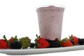Panoramic still life of colorful frozen fruit granita drinks flowing in plastic takeaway cups with ice cream straws