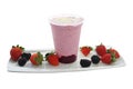 Panoramic still life of colorful frozen fruit granita drinks flowing in plastic takeaway cups with ice cream straws