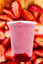 Panoramic still life of ice cream slush frozen colorful frozen fruit granita drinks flowing into takeaway plastic cups with ice Royalty Free Stock Photo