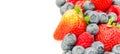 Panoramic studio shot pile of organic strawberries, blueberries and raspberries collection isolated Royalty Free Stock Photo