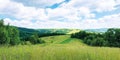 Panoramic summer countryside in mountains Royalty Free Stock Photo