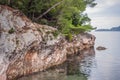 Panoramic summer landscape of the beautiful green Royal park Milocer on the shore of the the Adriatic Sea, Montenegro Royalty Free Stock Photo