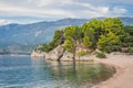 Panoramic summer landscape of the beautiful green Royal park Milocer on the shore of the the Adriatic Sea, Montenegro Royalty Free Stock Photo