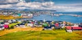 Panoramic summer sityscape of Torshavn town.