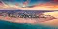 Panoramic summer view from flying drone of Libera Rimini public beach.