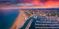 Panoramic summer view from flying drone of Libera Rimini public beach. Royalty Free Stock Photo