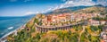 Panoramic summer view from flying drone of San Lucido - town and comune in the province of Cosenza in the Calabria region. Royalty Free Stock Photo