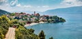 Panoramic summer view  of Gradac town. Sunny morning seascape of Adriatic sea, southernmost tourist locality of the Makarska rivie Royalty Free Stock Photo