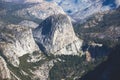 Panoramic summer view of Yosemite valley with Half Dome mountain, Tenaya Canyon, Liberty Cap, Vernal Fall and Nevada Fall, seen Royalty Free Stock Photo