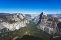 Panoramic summer view of Yosemite valley with Half Dome mountain, Tenaya Canyon, Liberty Cap, Vernal Fall and Nevada Fall, seen Royalty Free Stock Photo