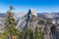 Panoramic summer view of Yosemite valley with Half Dome mountain, Tenaya Canyon, Liberty Cap, Vernal Fall and Nevada Fall, seen Royalty Free Stock Photo