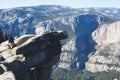 Panoramic summer view of Yosemite valley with Half Dome mountain, Tenaya Canyon, Liberty Cap, Vernal Fall and Nevada Fall, seen Royalty Free Stock Photo