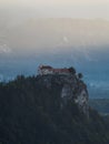 Panoramic sunrise view Lake Bled castle Blejsko jezero from Osojnica viewpoint hill Julian alps mountain Slovenia Europe Royalty Free Stock Photo