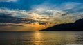 Panoramic sunset landscape with mountains and cloud sky form Marmaris, Kumlubuk, Turkey. Golden Hours