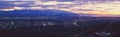 Panoramic sunset of Salt Lake City with snow capped Wasatch Mountains