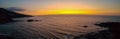 Panoramic sunset scene of a rocky beach in Pomos, Cyprus Royalty Free Stock Photo