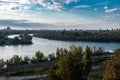 Panoramic sunset view of Belgrade Fortress, Kalemegdan Park, Sava and Danube Rivers in city. Royalty Free Stock Photo