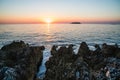 Panoramic sunset view over the rocky shore in Croatia, close to the Adriatic Sea. European vacation touristic destination Royalty Free Stock Photo