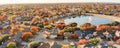 Panoramic top view lakeside houses and fall foliage near Dallas, Texas