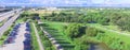 Panoramic top view park entrance car parking near freeway in Houston