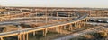 Panoramic top view stack highway viaduct with traffic near Dallas, America