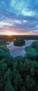 Panoramic vertical Aerial view of a beautiful sunset and sky reflection in the water in summer, colorful clouds