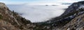 Panoramic View: Above the clouds: Beautiful sunny hiking day in the austrian alps Royalty Free Stock Photo