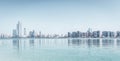 Panoramic view of Abu Dhabi Skyline UAE with skyscrapers and sea Royalty Free Stock Photo